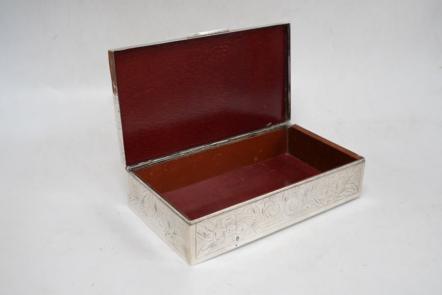 A continental 900 standard white metal mounted rectangular cigarette box, with engraved foliate decoration, 17.6cm.